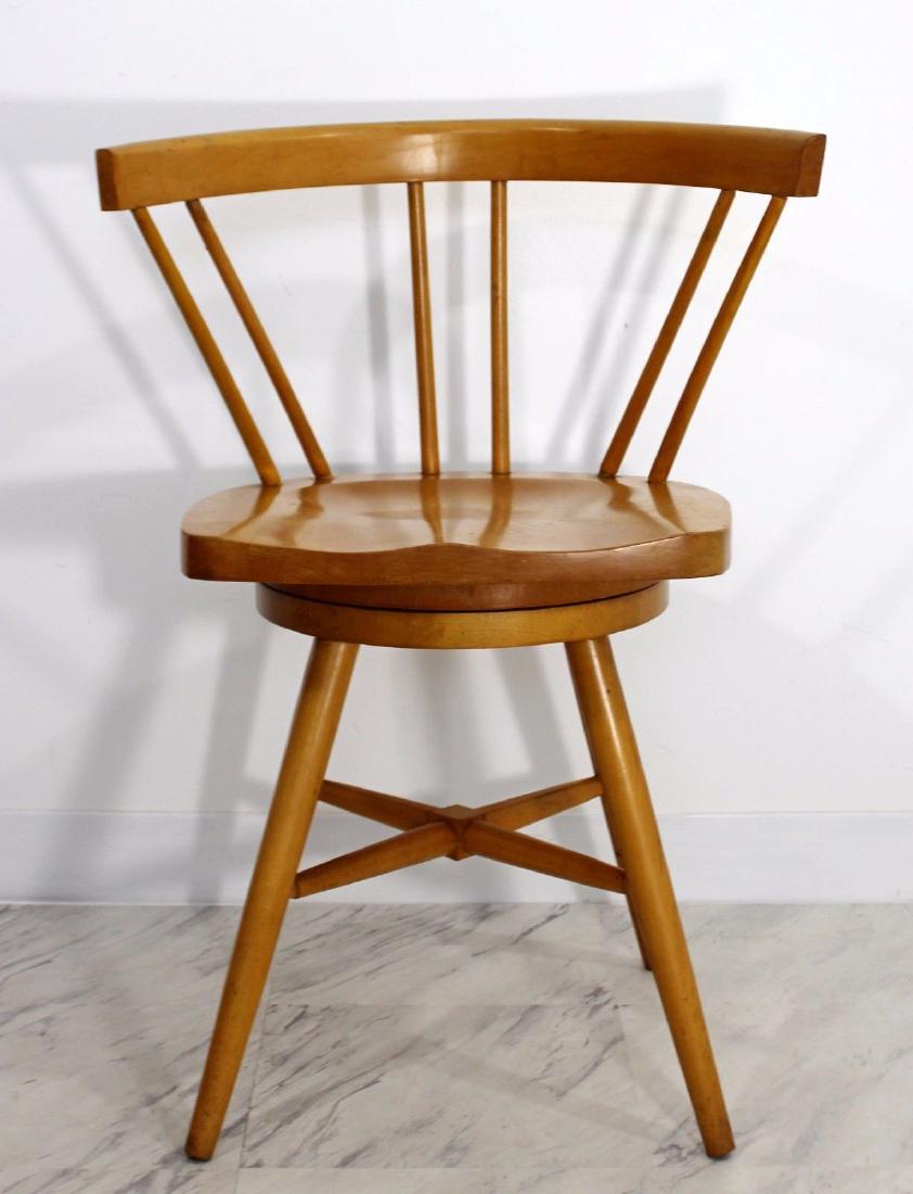 Northwest Chair Spindle Back Swivel Chair McCobb Style: For your consideration is a delightful, curve backed, swivel chair, by the Northwest Chair Company, in style of Paul McCobb, circa the 1950s/1960s. In excellent condition. The dimensions are 16.5" W x