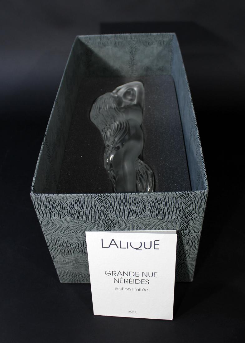 Contemporary Lalique Signed Nude Nymph Crystal: For your consideration is a stunningly beautiful, Lalique crystal table sculpture of a nude, water nymph, signed and numbered 139/999. In excellent condition. The dimensions are 6" Dia x 18" H. Comes
