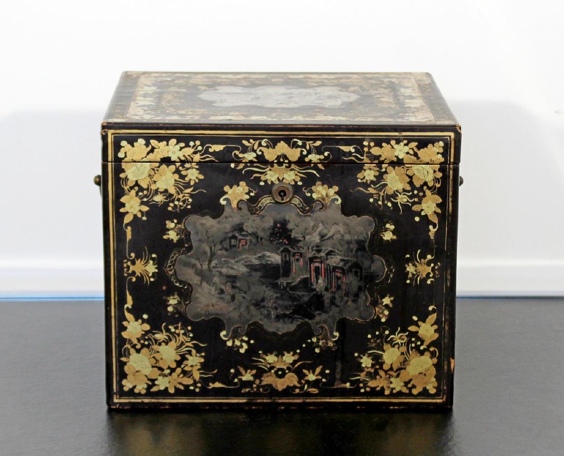 Vintage Ornate Floral Asian Chinese Lacquered Tea Caddy: Late 18th/early 19th century Ornate Chinese lacquered, gold gilded tea caddy Interior boxes fitted with pewter with carved knobs and etched doors. The box is stunningly decorated with hand painted vig