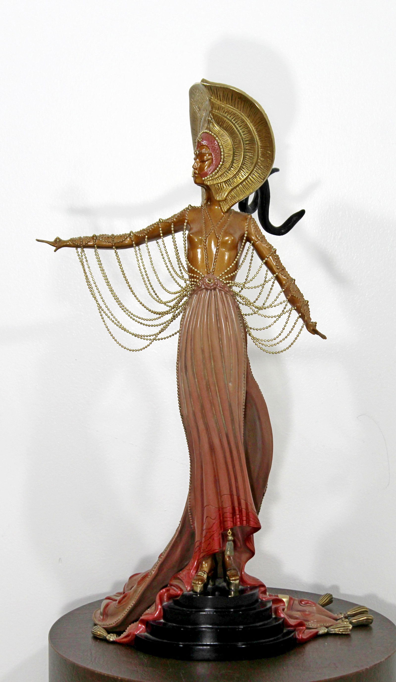 Erte Limited Edition Bronze Table Sculpture L'Orientale: For your consideration is an incredible, limited edition, bronze table sculpture of a majestic woman, by Erte, dated 1989. In excellent condition. The dimensions are 12" (1') W x 13" D x 22" H.