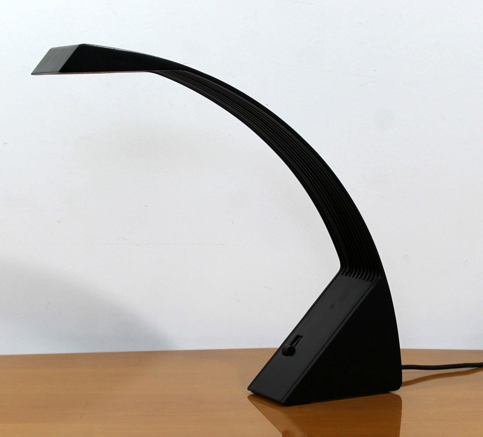 Modern Arcobaleno Black Metal Lamp Marco Zotta Italy: For your consideration is a Arcobaleno, black enameled, desk lamp, by Marco Zotta dor Cil Roma, Italy, circa the 1970s. In excellent condition. The dimensions are 3.5" W x 16" D x 15.5" H.