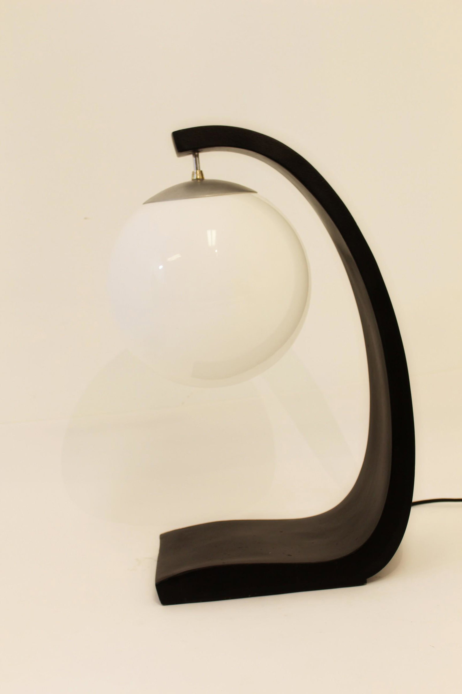 Modern Retro Mod Space Age Black Modeline Table Lamp: For your consideration is rare, curvy table lamp in black by Modeline, circa the 1970s. In great condition with some minor paint scratches. Pair is available, but not identical. The dimensions are 8.5