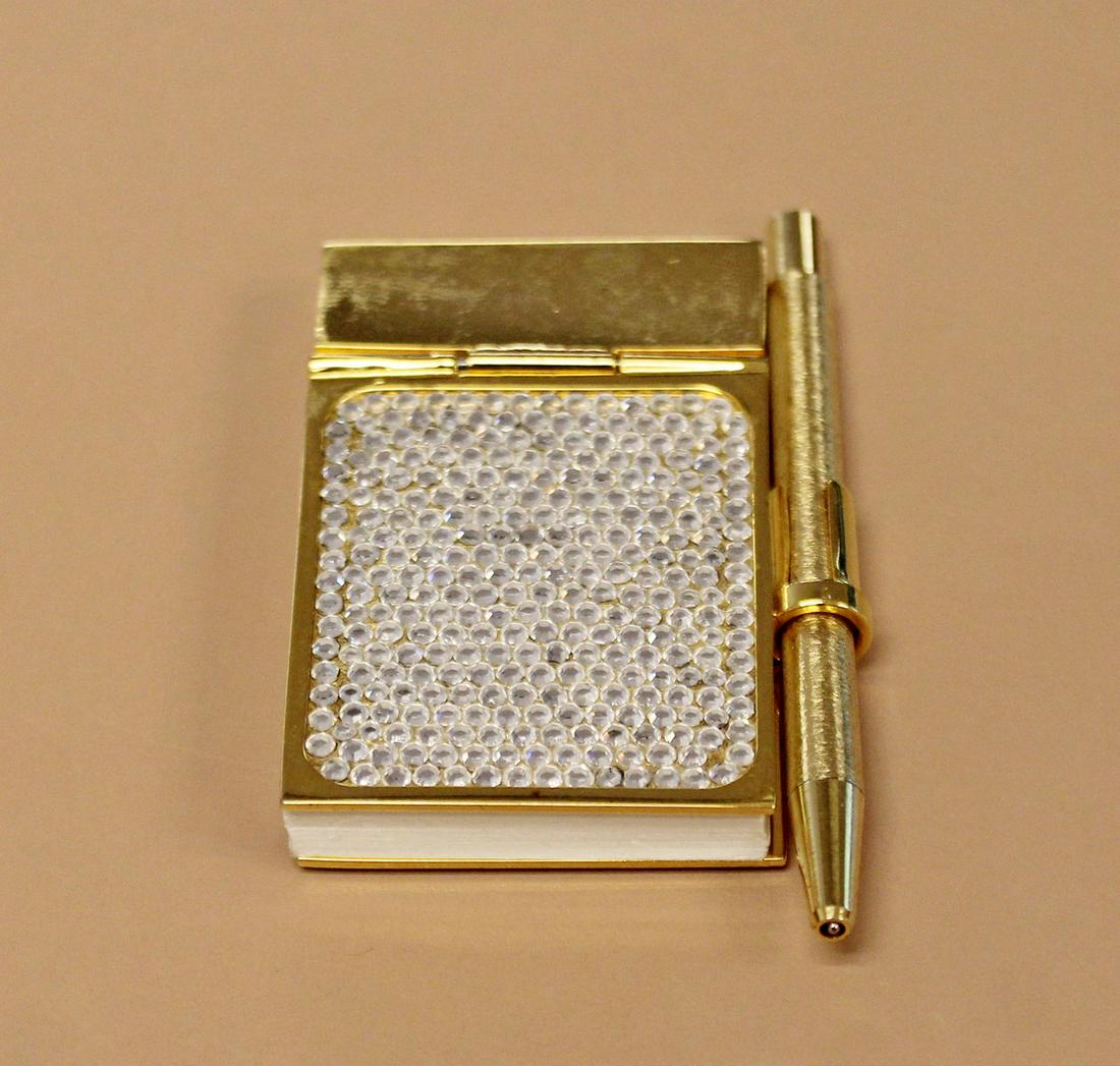 Judith Leiber Notepads Vintage Jeweled: For your consideration is this stunning, gold-tone metal, Judith Leiber notebook, with clear swarovski crystal embellishments throughout and attachment on side. Includes blank paper and gold-tone ball