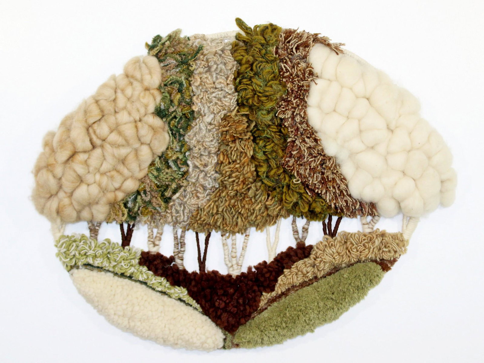 Modern Earth Tone Round Scuptural Wool Fiber Wall Art: For your consideration is a stunning, fluffy wool, fiber wall art, in Earth tones, circa the 1970s. In excellent condition. The dimensions are 33.5" W x 3" D x 26" H.