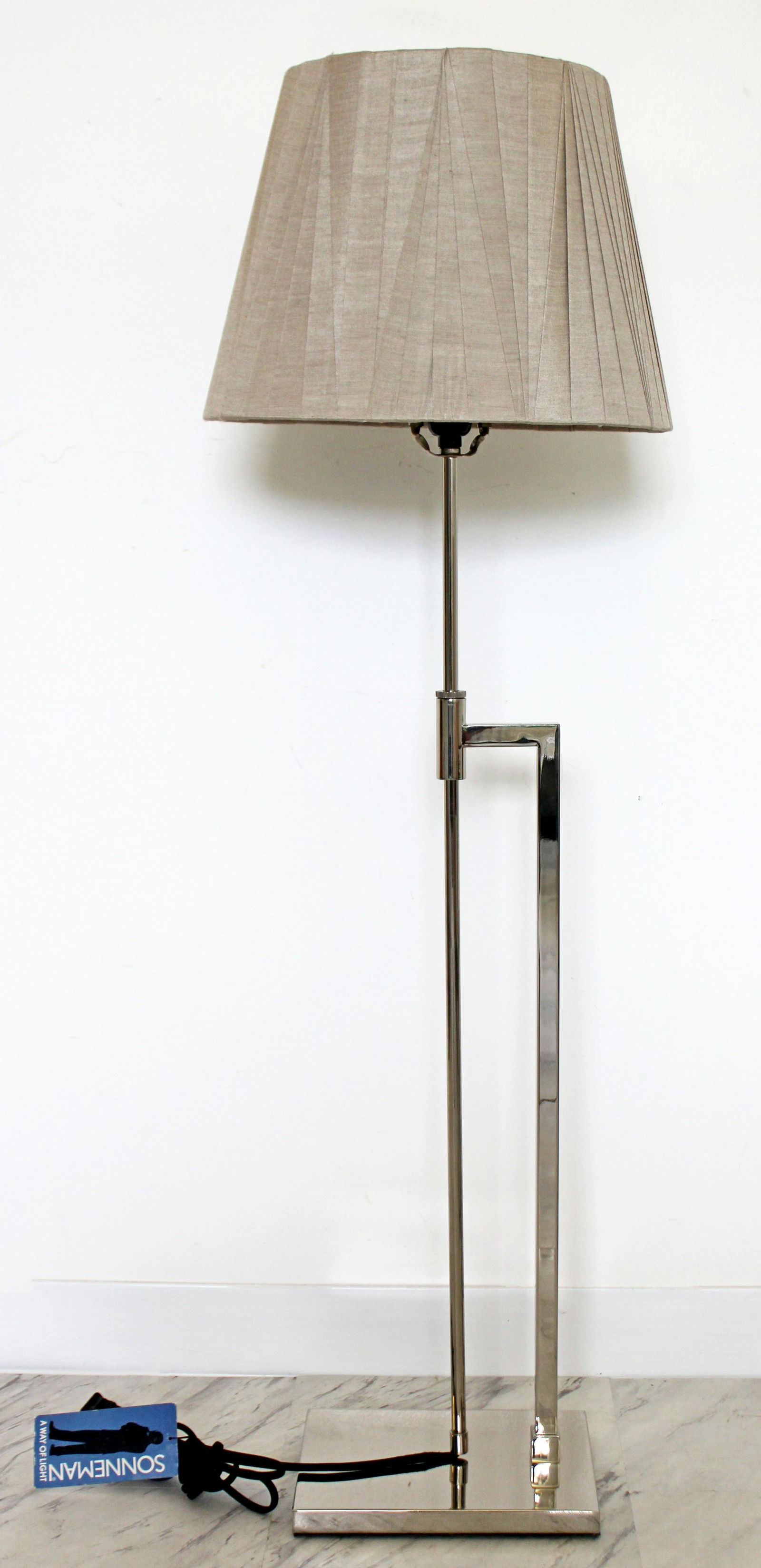 Robert Sonneman Adjustable Chrome Floor Lamp Shade &: For your consideration is an adjustable height chrome lamp by Robert Sonneman, with its original tag, shade and finial. In excellent condition. The dimensions of the base are 8" W x 10" D and the lamp