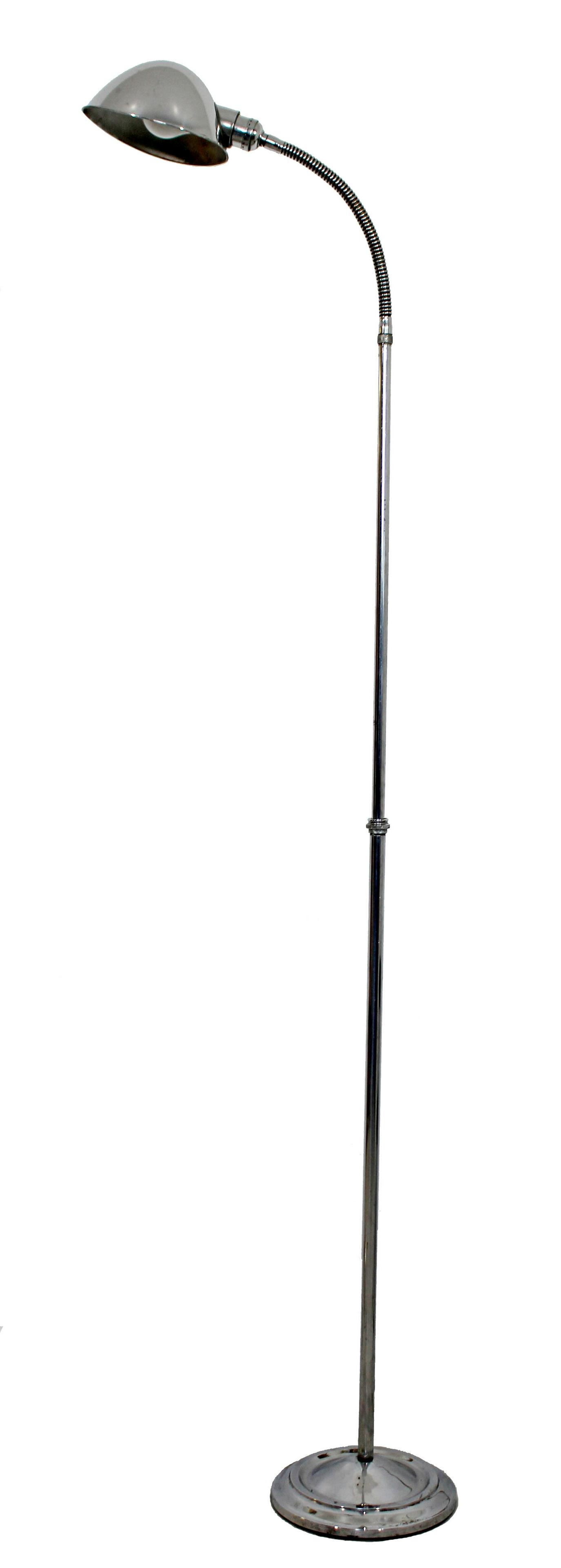 Faris Aluminum Adjustable Head Floor Lamp '70s Sonneman: For your consideration is a lovely, aluminum floor lamp with an adjustable head, by Faris, circa the 1970s. In very good condition. The dimensions are: Base: 9" Dia Total Possible Height: 75" Arm:10" 