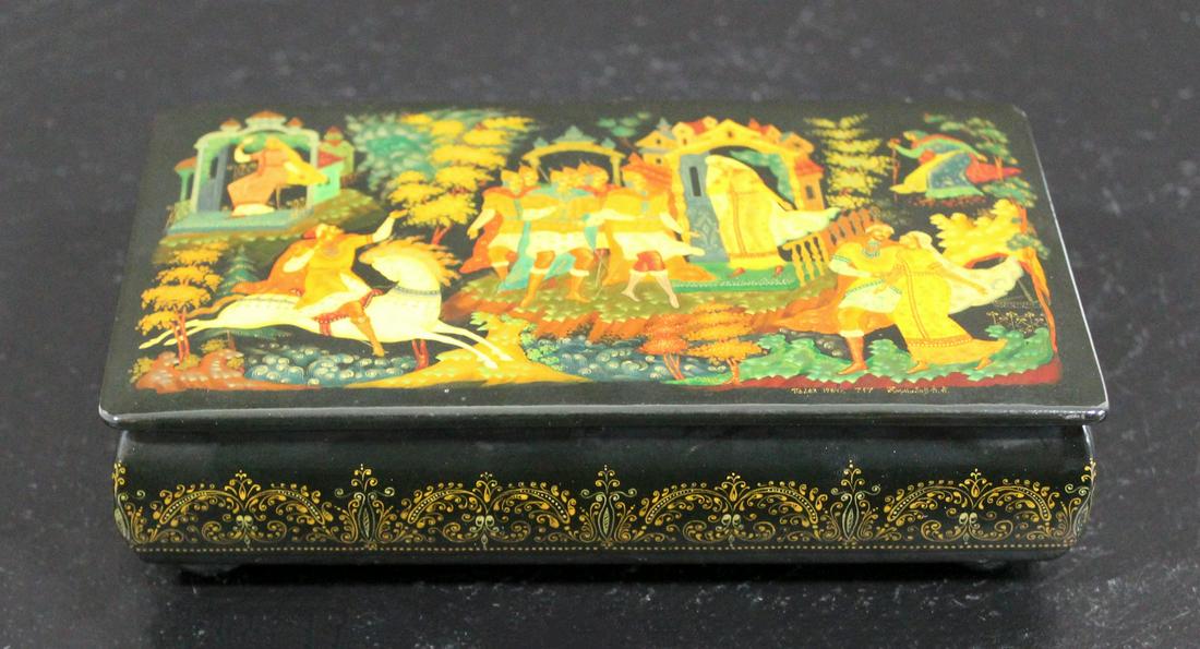 Black Gold Lacquer Box by Kornilov Alexander: For your consideration is a luxe looking, lidded, hand painted, Russian Lacquer palekh box, signed by Kornilov Alexander Albertovich. This piece offers intricate folk lore paintings. In excellent anti