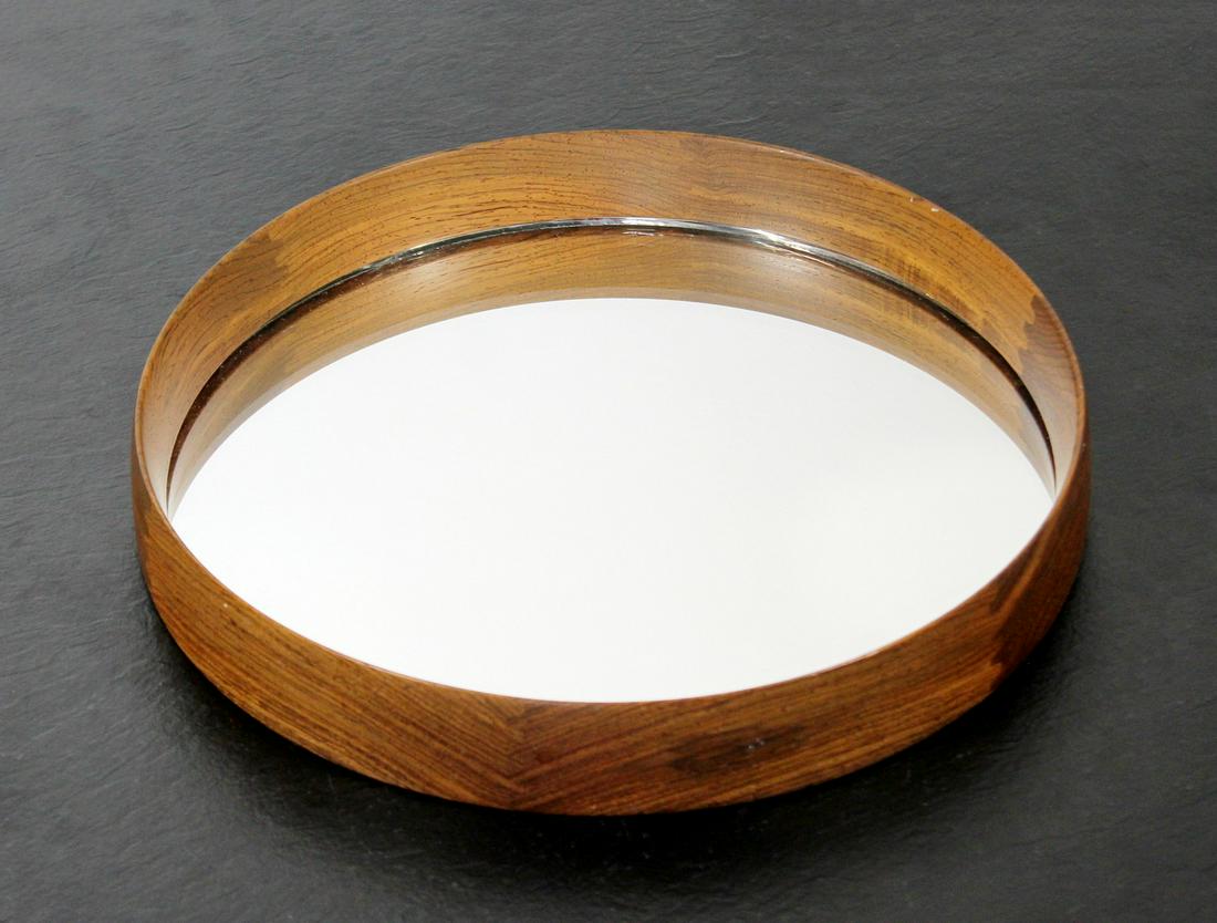 Luxus Vittsjo Teak Mirror Osten Kristiansson Danish: For your consideration is a wonderful, circular mirror, by Osten Kristiansson for Luxus Vittsjo, circa the 1960s. In excellent vintage condition. The dimensions are 11" Dia x 2" D.