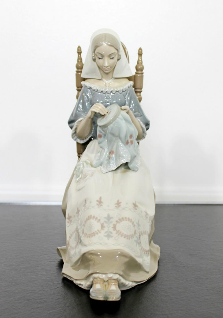 Porcelain Bordadora Insular Table Sculpture Signed: For your consideration is a stunning, porcelain table sculpture, entitled "Bordadora Insular," stamped Lladro, hand made in Spain, circa the 1970s. In excellent condition. The dimensions are 8.5" W x 