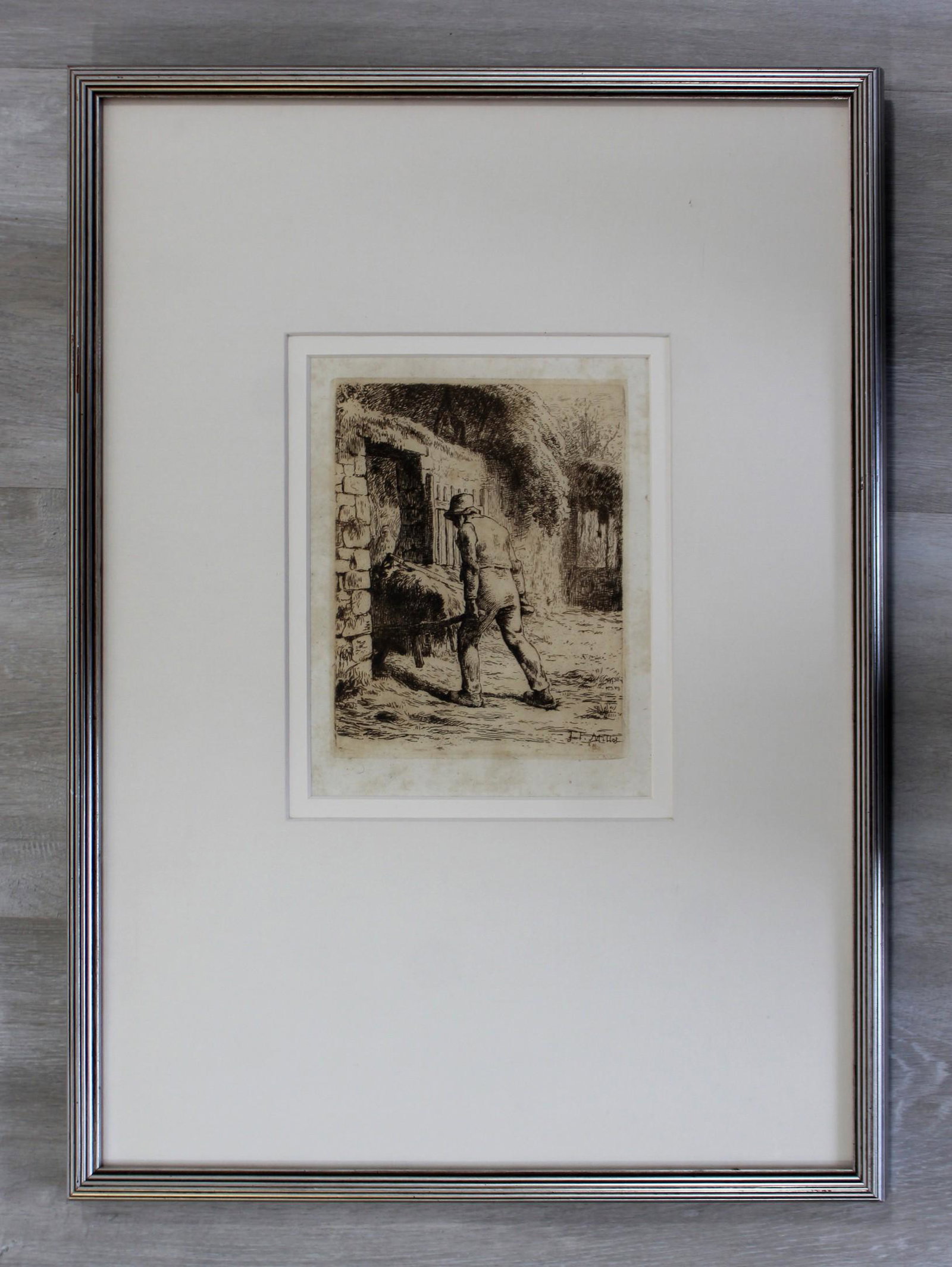 Framed Jean Francois Millet Man w Wheelbarrow Etching: For your consideration is a framed etching of Jean Francois Millett's "Man with Wheelbarrow," circa the 1800s. In excellent antique condition. The dimensions are 14.5" W x 19.5" H.