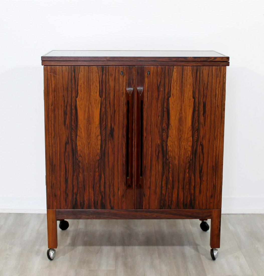 Rosewood Flip Top Bar Cart Torbjorn Adfal Bruksbo: For your consideration is a magnificent, rosewood bar cart, with a black flip top, on casters, designed by Torbjorn Adfal, circa the 1960s. In excellent condition. The dimensions are 30"/60" W x 16" D