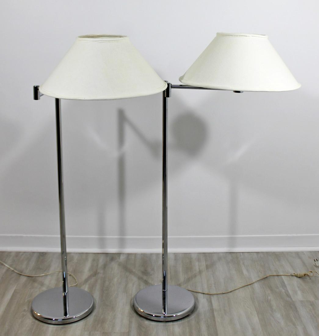 Pair of Von Nessen Articulated Chrome Floor Lamps 1970s: For your consideration is a gorgeous pair of swing arm floor lamps, made of chrome, by Von Nessen, circa the 1970s. In excellent condition. The dimensions are 18.5" Dia x 50" H.