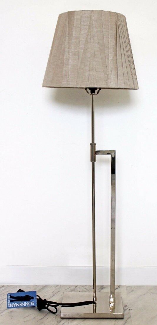 Robert Sonneman Adjustable Chrome Floor Lamp: For your consideration is an adjustable height chrome lamp by Robert Sonneman, with its original tag, shade and finial. In excellent condition. The dimensions of the base are 8" W x 10" D and the lamp