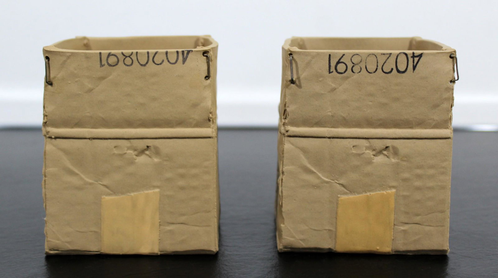 Michel Harvey Set of 2 Clay Ceramic Box Sculptures: For your consideration is a whimsical pair of ceramic box table sculptures, by Michel Harvey. In excellent condition. 3.75" Sq x 4.5" H each.