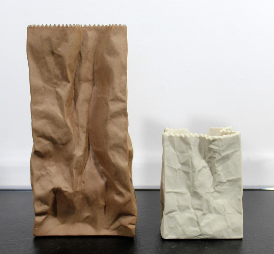 Rosenthal Stamped Set of 2 Ceramic Bag Table Sculptures: For your consideration is a realistic pair of ceramic bag table sculptures, stamped by Rosenthal. In excellent condition. 4" W x 3" D x 9" H and 3.5" W x 3" D x 4.5" H.