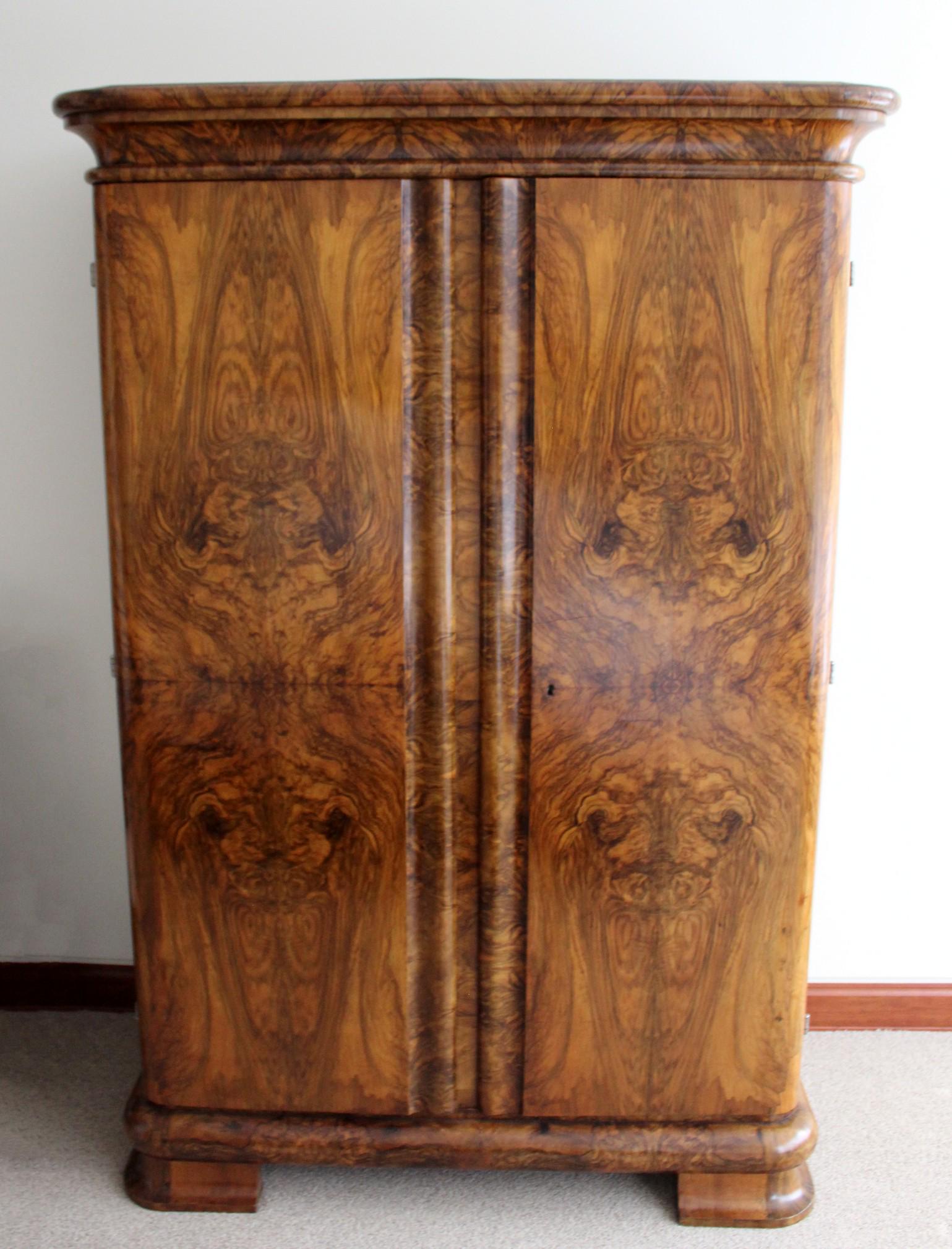 Vintage Art Deco Curved Burl Wood Armoire Dresser: For your consideration is a beautiful, Vintage tall, burl wood book matched panel cabinet armoire wardrobe unit, , circa the 1940s. In very good vintage condition. The dimensions are 51" W x 24" D x 7