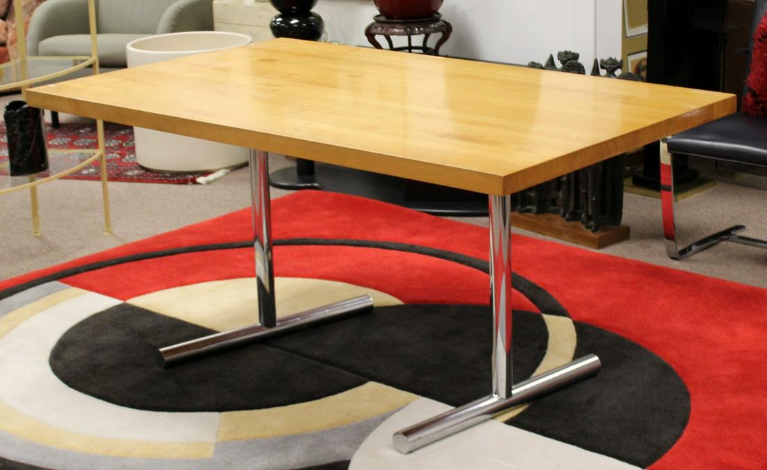 Thompson Chrome & Wood Rectangular Dining Table 1970s: For your consideration is a gorgeous, rectangular, chrome and wood dining table, circa the 1970s. In good vintage condition. The dimensions are 60" L x 36" D x 29.5" H.