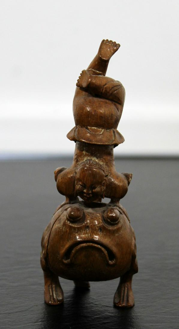 Small Carved Man & Frog Netsuki Table Sculpture Trinket: For your consideration is a Small Carved Man & Frog Netsuke Size is 2" Dia x 5" H. This is a wonderful carved wood netsuke Asian carving of a man on a toad. Frogs and toads are a symbol of prosperity 