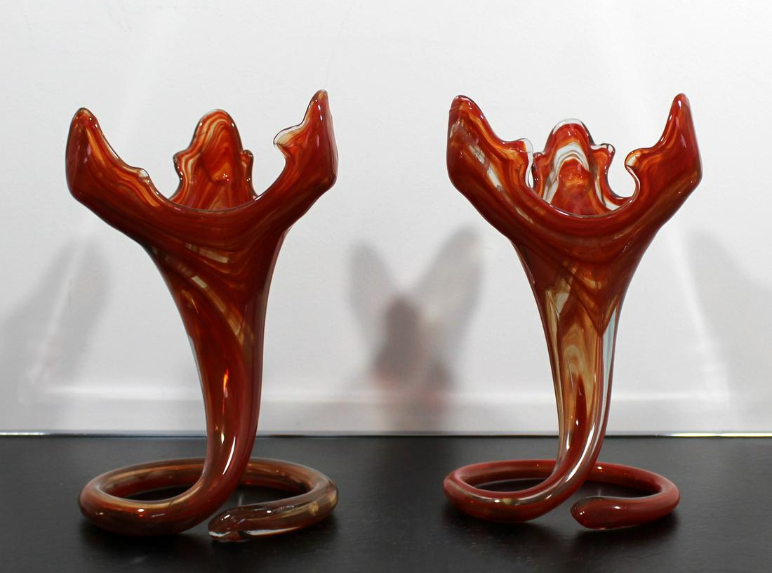 Sooner Hand Stretched Blown Glass Pair Red Sculptures: For your consideration is a pair of deep red, hand blown and stretched glass table sculptures or vases by Sooner. In excellent condition. The dimensions are 7.5" W x 6.5" D x 11.5" H each.