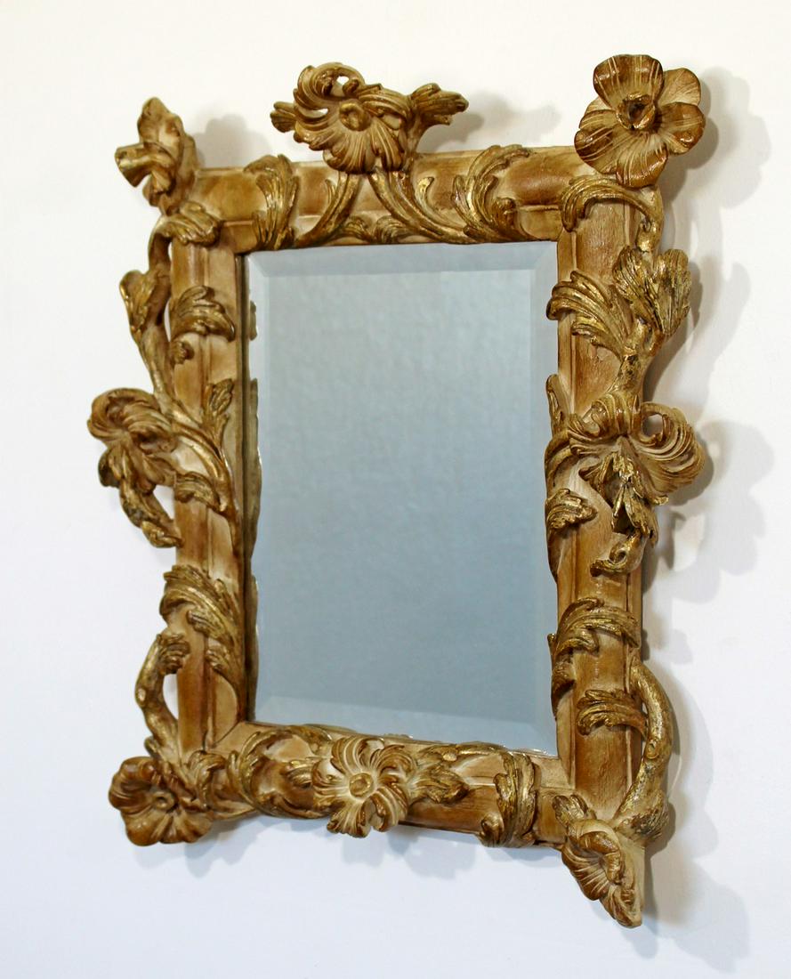 Rococo Gold Gilt Carved Floral Single Wood Wall Mirror: For your consideration is a sensational, gold gilt wall mirror, carved from a single piece of wood, with a floral design, circa the 1960s. In excellent vintage condition. The dimensions are 20" W x 4.