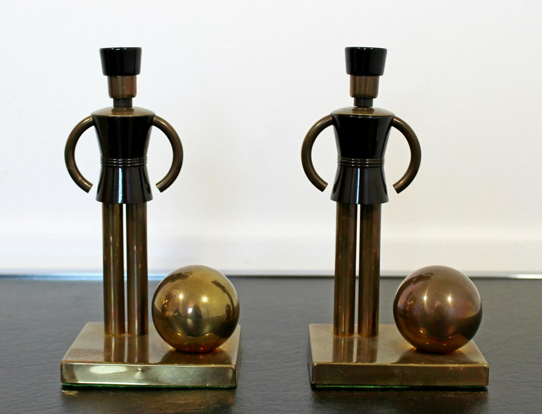 Art Deco Walter Von Nessen Chase Brass Bakelite: For your consideration is a fantastic pair of brass and bakelite bookends, Toys for Chase, by Walter Von Nessen. In very good vintage condition, with a patina to match the age. The dimensions of each