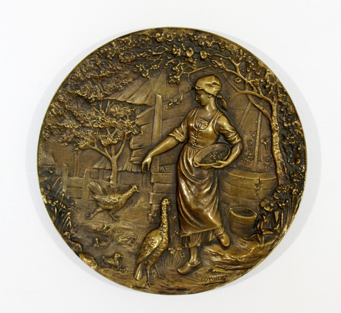 Early 20th Century Edouard Drouot Signed Bronze Wall: For your consideration is a brilliant, round wall relief, art sculpture, depicting a peasant girl, signed by Edouard Drouot. In excellent condition. The dimensions are 10.25" Dia.