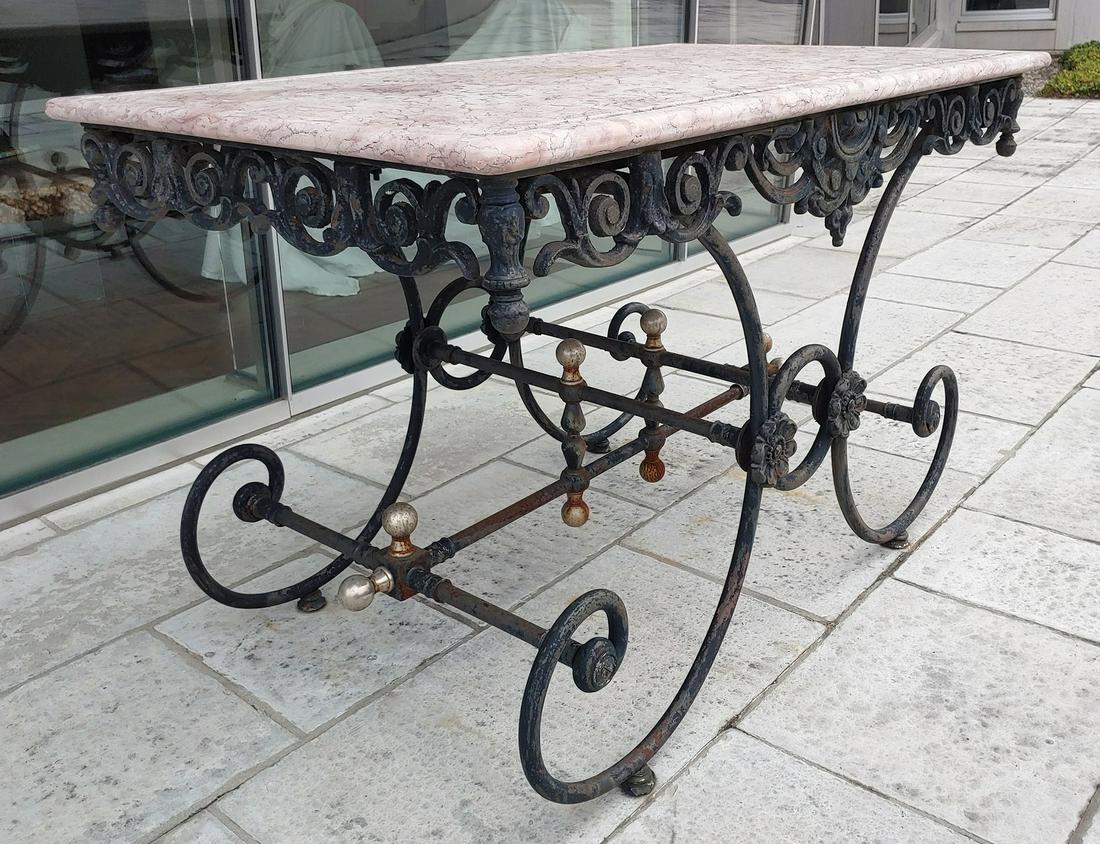 Antique French Style Bistro Patio Iron & Pink Stone: For your consideration is a lovely, Antique French style wrought iron, indoor outdoor bistro table, with a pink stone top. In very good vintage condition. The dimensions are 48.25" W x 29.5" D x 31" H