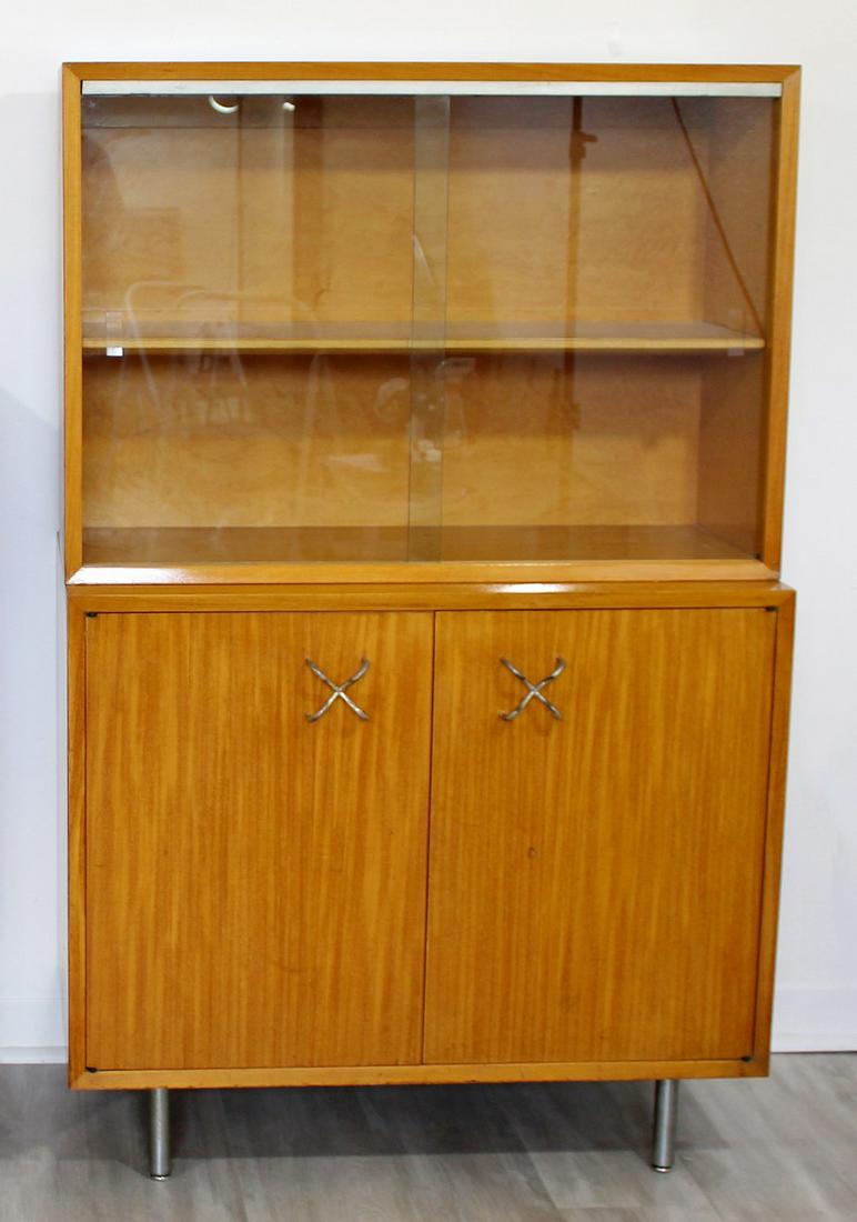 George Nelson Herman Miller Highboy Cabinet Hutch 1960s: For your consideration is a fantastic, light wood cabinet, with aluminum X pulls, by George Nelson for Herman Miller, circa the 1960s. In very good vintage condition. The dimensions of the cabinet bel