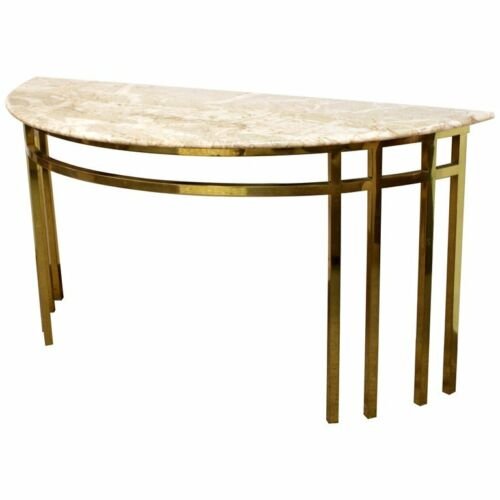 Modern Marble on Brass Demilune Console Table: For your consideration is an incredible, half-moon demilune console table, with a marble top on a sculptural brass base, in the style of Tommi Parzinger, circa the 1960s. In excellent patinated condit