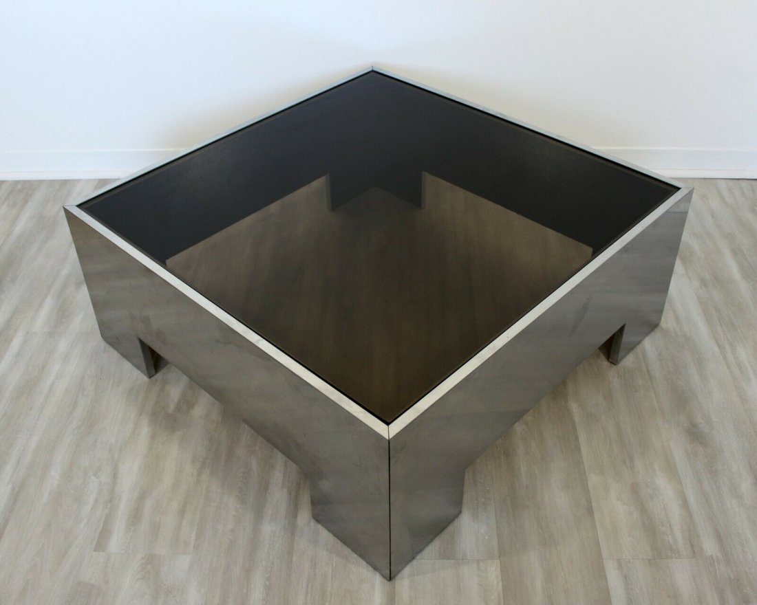 Square Brushed Aluminum & Smoked Glass Coffee Table: For your consideration is a fantastic, square coffee table, with a smoked glass top on a brushed aluminum base, circa the 1970s. Attributed to Brueton or Pace. In excellent vintage condition. The dime