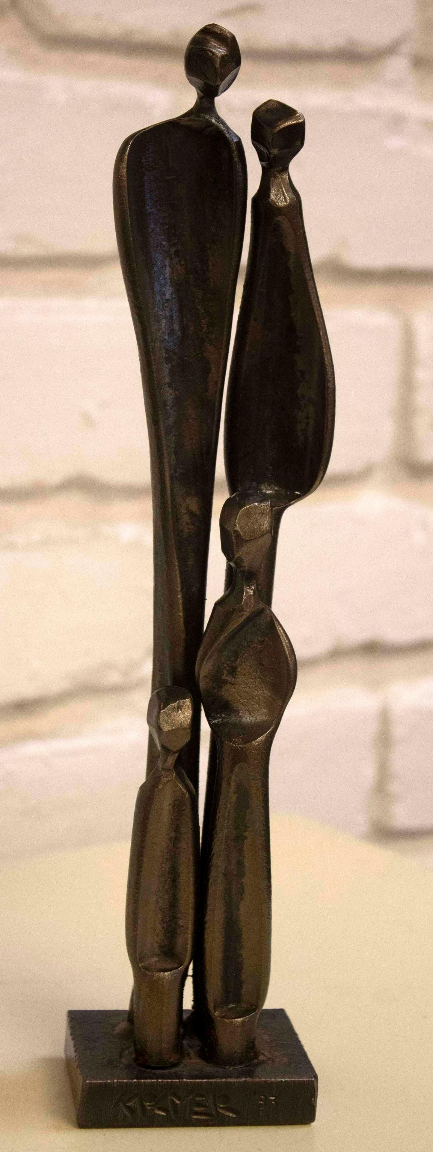 Boris Kramer Family of Four 1984 Bronze Sculpture: For your consideration is a lovely bronze sculpture of a family of four dated 1984 by Canadian artist Boris Kramer (11”h x 2.5”w x 2”d). In excellent condition. Boris Kramer was born