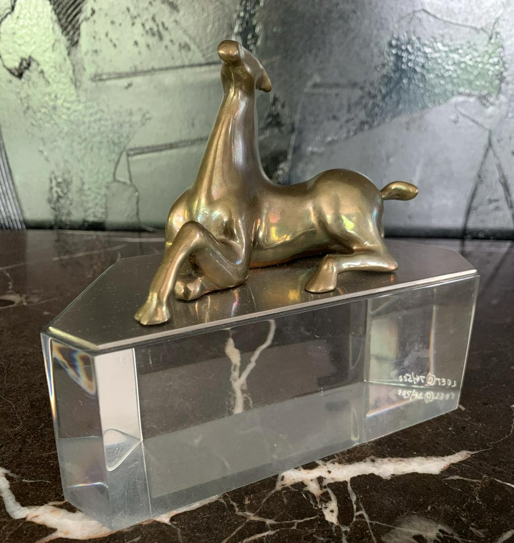 Loet Bronze Horse on Lucite Base Laying Down 74/500: For your consideration is a stylizied bronze horse reclining on a lucite base. Loet 74/500 inscribed to side of lucite base.Dimensions: 5.5” x 6.25” x 2.5”