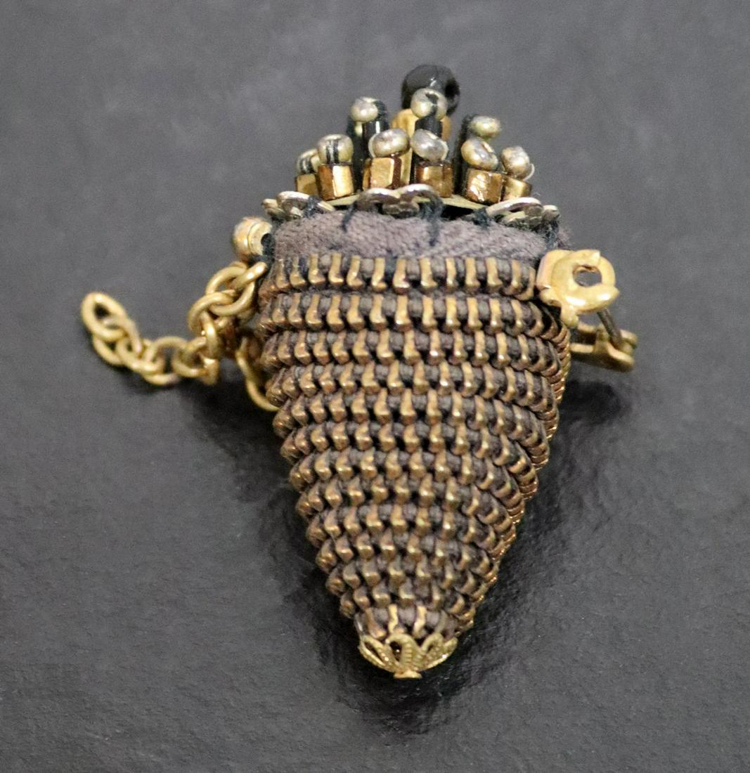 Susie Colquitt Zipper Brooch Metal Sculpture: For your consideration is a stunning sculpture brooch made of zippers and metal created by Susie Colquitt. Dimensions: 2h x 1 dia. In excellent condition. Susie Colquitt (1955- ) is a contemporary Ame