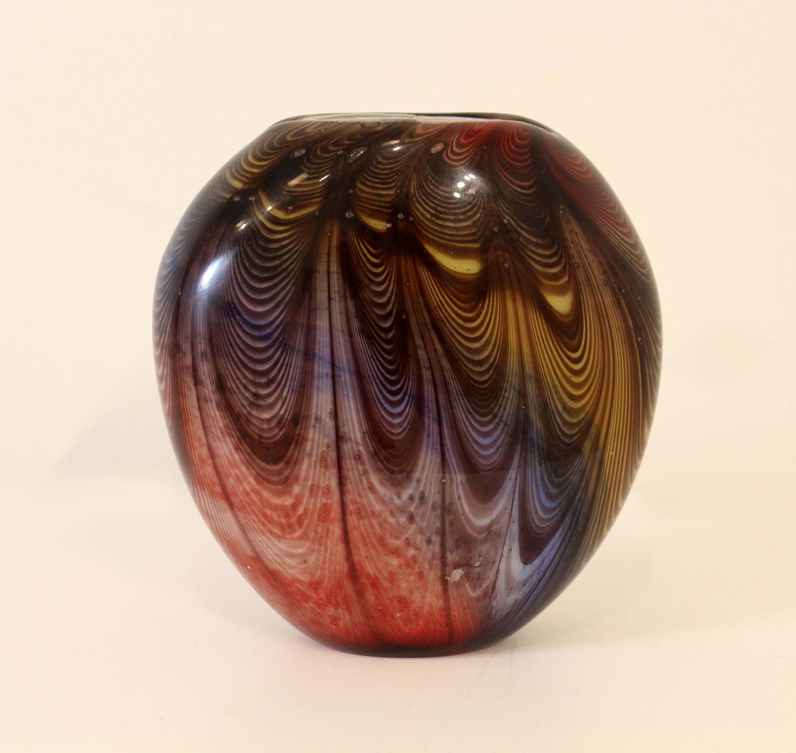 Vintage Blown Art Glass Feathered Design Red Blue Yellow Vessel Vase: For your consideration is this unmarked vintage blown art glass vase vessel. Dimensions: 6w x 3d x 6.25h Provenance: This item was curated from the estate of Kenneth Robert Stanley (1957-2022) who was
