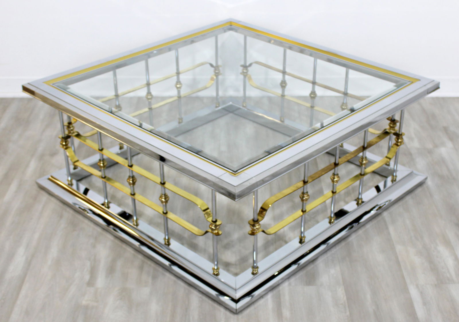 Mid Century Modern Maison Jansen Chrome Brass & Glass Square Coffee Table 1960s: For your consideration is a fabulous coffee table, made of brass, chrome and with a glass insert top, by Maison Jansen, circa the 1960s. In very good vintage condition, with a patina to match age and
