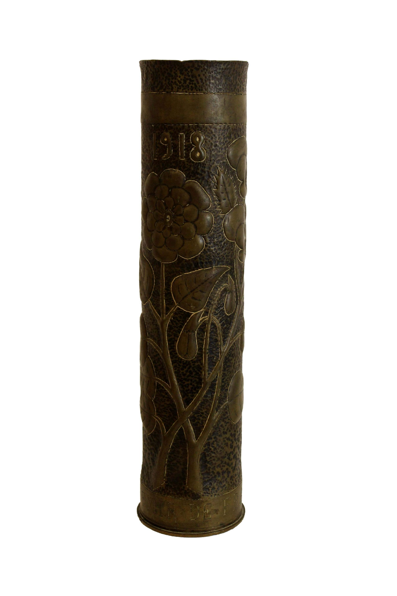 Antique WWI Trench Art Shell Casing 1918 Brass Cylinder Floral Design: A historical relic - shell casing from WWI trenches turned into an artwork the years following the war. Brass cylinder with a hammered floral design dated 1918. Bottom is etched 15 DEC MAI 1891 17 BO.