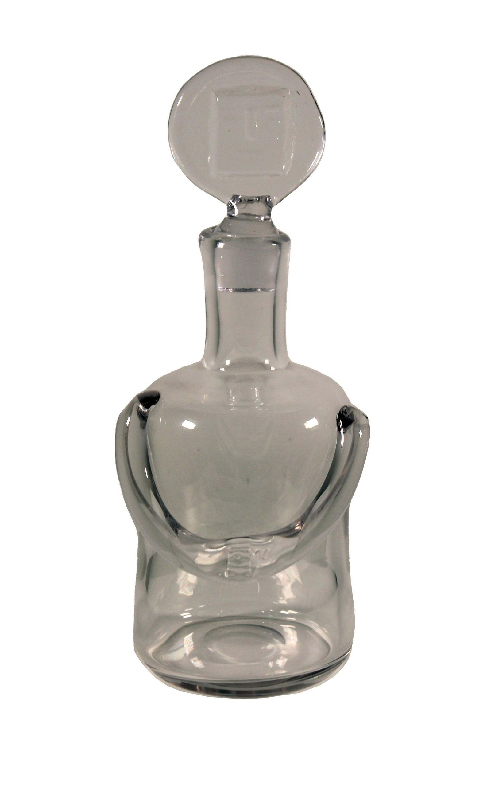 Erik Hoglund Midcentury Modern Clear Glass Decanter People Male Sweden 1960s: An iconic midcentury modern clear glass decanter by Swedish artist Erik Hoglund. The lid of the bottle has his infamous male face design. Etched on bottom H. / 346 / 65. From a private collection. Dim