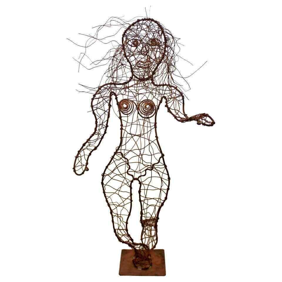 Contemporary Forged Copper Wire Nude Woman Female Figure Table Sculpture 2000s: A whimsical, forged copper metal wire sculpture of a nude woman, by Robert D. Hansen. In excellent condition. The dimensions are 13" W x 12" D x 27" H.
