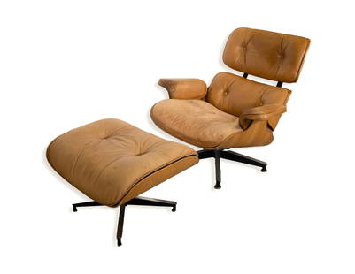 Eames for Herman Miller Lounge Chair & Ottoman Oak with Light Brown Leather: Eames Herman Miller oak with light brown leather lounge chair & ottoman. This iconic lounge chair is a staple of mid century modern homes and offices. This piece is in fair vintage condition. The leat