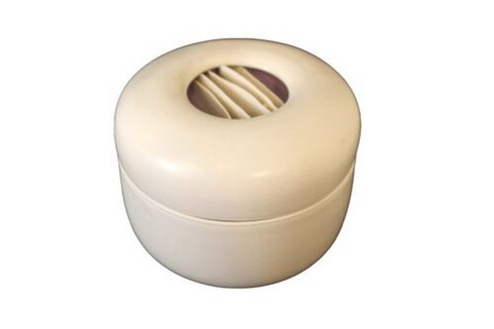 Joan Lurie Signed Porcelain Lidded Vessel with Ribbon Design: A chic porcelain lidded vessel sculpture by Joan Lurie. Signed on bottom. The lid of the vessel has an organic waved ribbon design in the center. From a private collection. Dimensions: 3.75h x 4.75dia