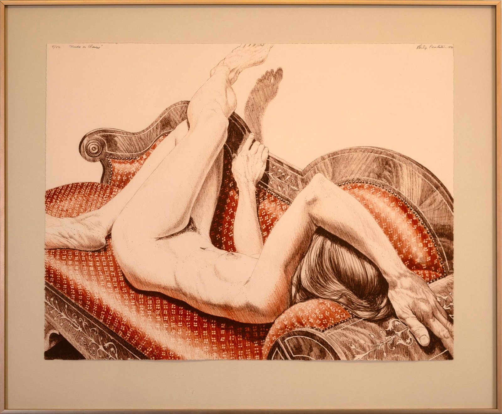 Philip Pearlstein Nude on Chaise Signed Contemporary Lithograph on Paper 5/50 Framed 1978: A contemporary figurative lithograph in colors on paper titled "Nude on Chaise" by Philip Pearlstein. Hand signed in pencil top right, dated 1978, with an annotation of 5/50 and titled top left. Phili