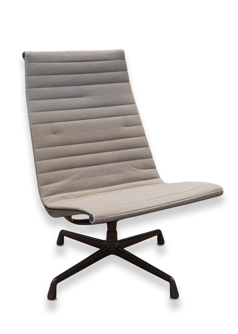 Eames for Herman Miller Aluminum Group Grey Fabric Swivel Chair Early Modernist Office 1960s: An early mid century modern Eames for Herman Miller aluminum group swivel chair. A super iconic piece from Eames and Herman Miller featuring a full aluminum frame construction, a super soft grey fabri