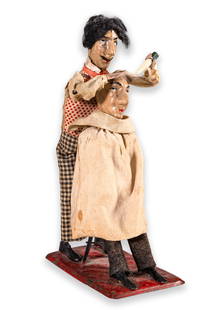 Fernand Martin L’ Artiste Capillaire Windup Clockwork Antique Tin Figure Toy France 1905: An antique windup clockwork tin figure toy titled “L’ Artiste Capillaire” (The Hair Artist) produced by Fernand Martin. Made in France, circa 1905. Painted tinplate and fabric details. Maker