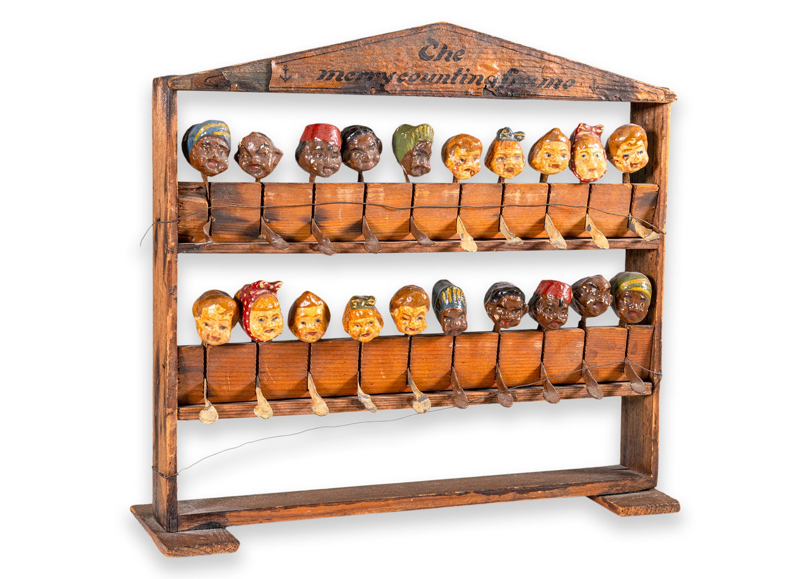 The Merry Counting Frame Antique Abacus Hand Painted Metal Figures Heads in Wood Frame 1900: An antique abacus titled “The Merry Counting Frame”. Circa 1900. Hand painted metal figures with various distinctive features in a wooden frame. An interactive toy made to help children le