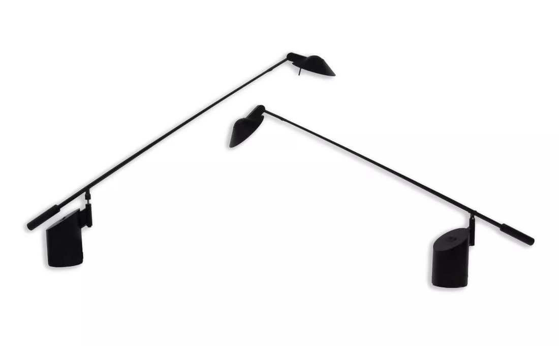 Robert Sonneman for George Kovacs Feather Task Lamps Mid Century Modern: Sleek and functional, this pair of black metal feather desk lamps is a striking example of Mid-Century Modern design. With clean lines and an adjustable counterbalance system, these lamps combine time