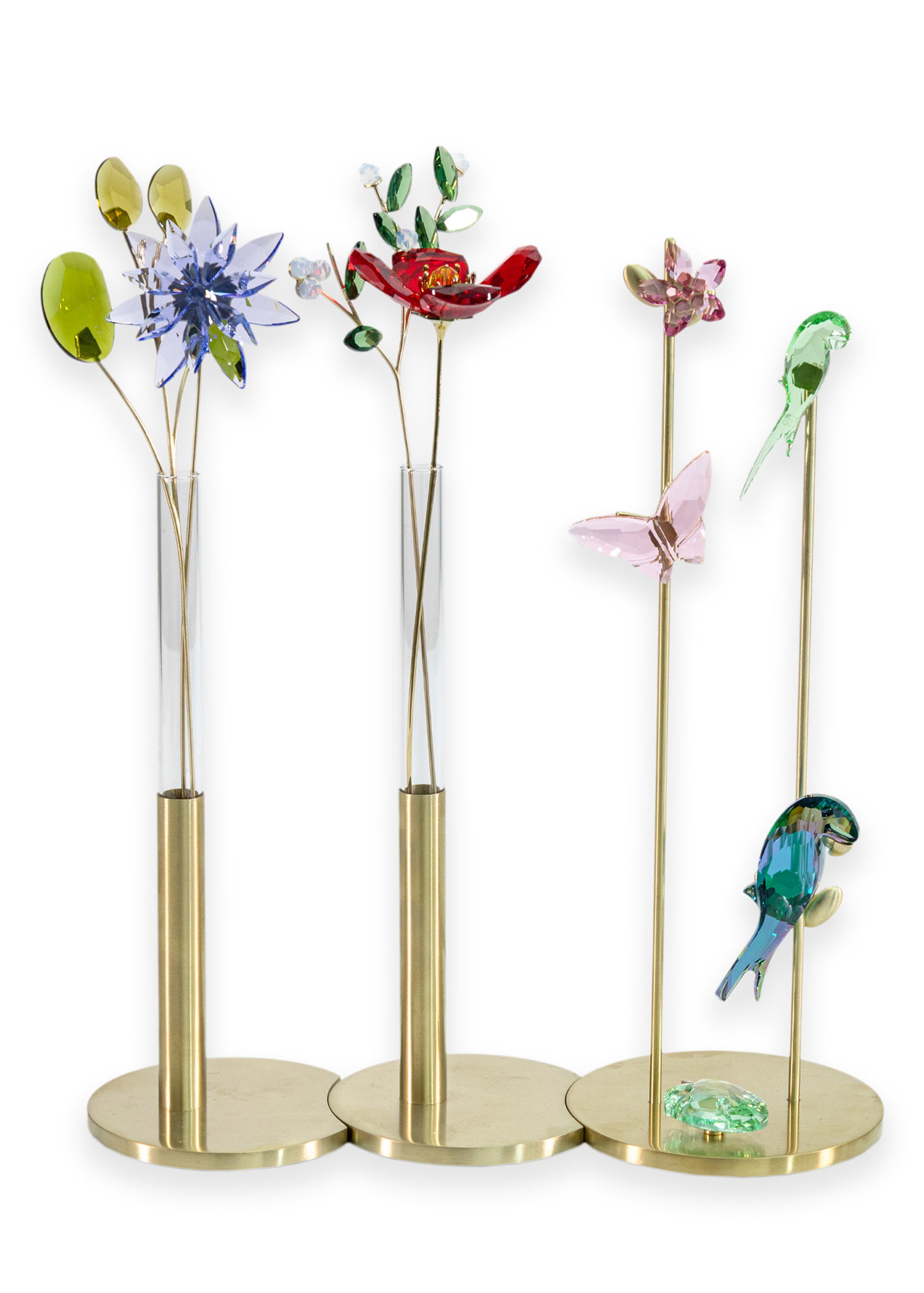 Swarovski Garden Tales Set IV Contemporary Crystal Glass Collectables: A stunning display from Swarovski’s “Garden Tales” collection, this curated set of crystal floral stems showcases intricate craftsmanship and vibrant color. Each glass flower feature