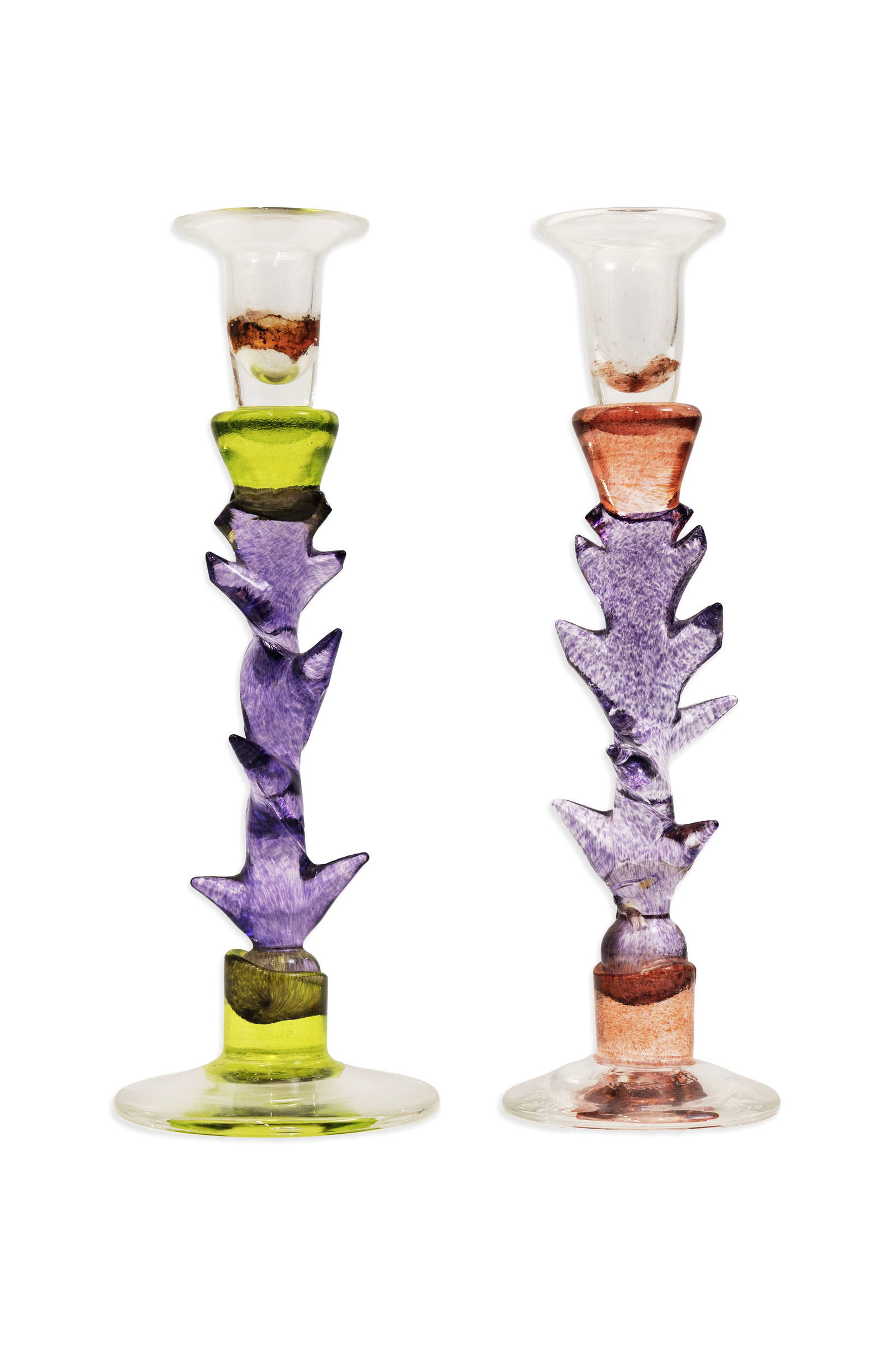 Annette Meech Staggered Candlesticks Signed c. 1990s Assembled Blown Art Glass: A vibrant pair of hand-blown art glass candlesticks by British glass artist Annette Meech, circa 1990s. Signed by the artist. Each features an inventive stacked form composed of multicolored glass seg