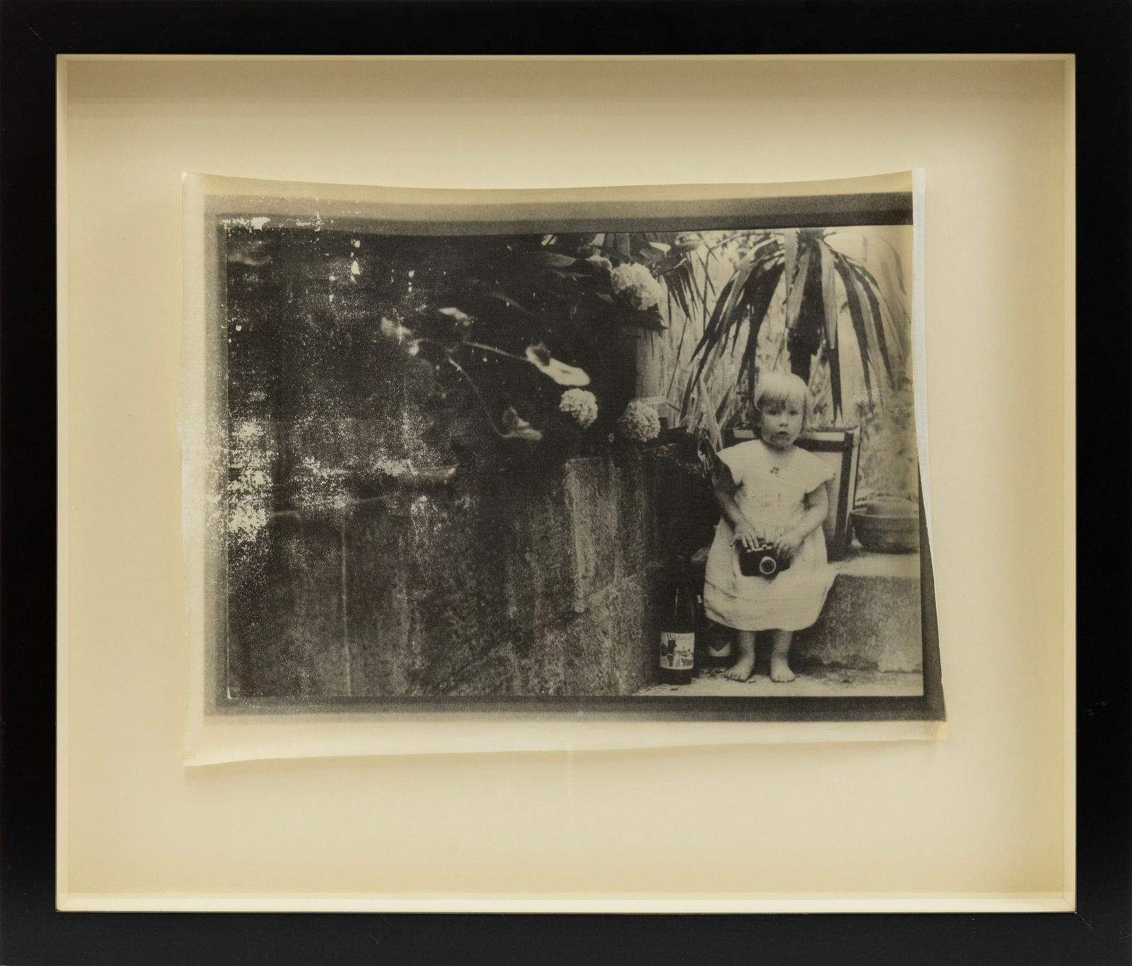 Annelies Strba Linda mit Kamera 1978 Heliogravure Contemporary Portrait Photography: A poetic and intimate work by Swiss artist Annelies Strba (b. 1947), "Linda mit Kamera" captures a quiet domestic moment in the artist's signature dreamlike style. Executed as a heliogravure, the imag