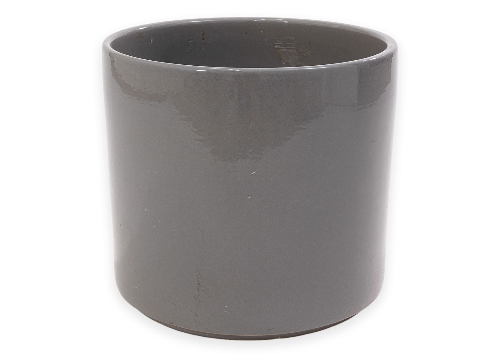 Gainey Ceramics Planter (Grey) Stamped Model AC-14 California Mid-Century Modern Design: Ceramic planter of cylindrical form with straight sides and a flat base, finished in a glossy grey glaze. The underside is impressed with the “Gainey Ceramics” mark and model number “