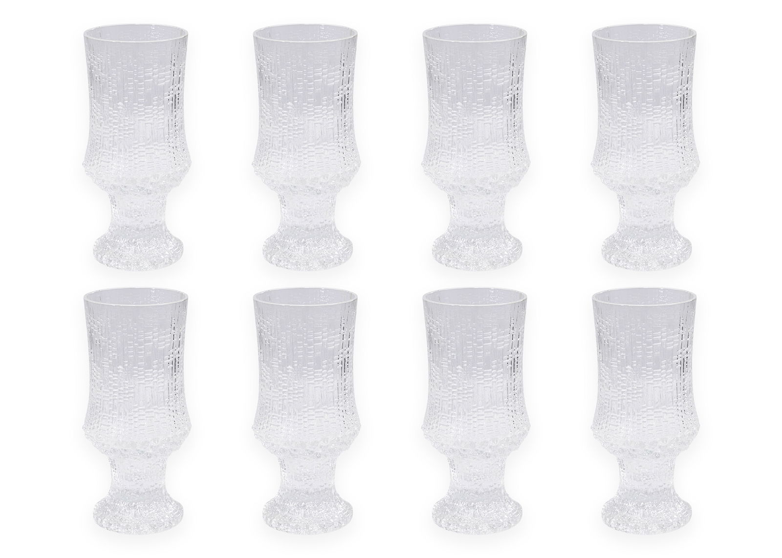 Tapio Wirkkala for Iittala Ultima Thule (8) Glasses / Goblets Art Glass Finland, c. 1970s: Set of eight vintage “Ultima Thule” goblets designed by Tapio Wirkkala for Iittala. Crafted in Finland in the 1970s, these iconic art glass glasses feature the signature textured surface i